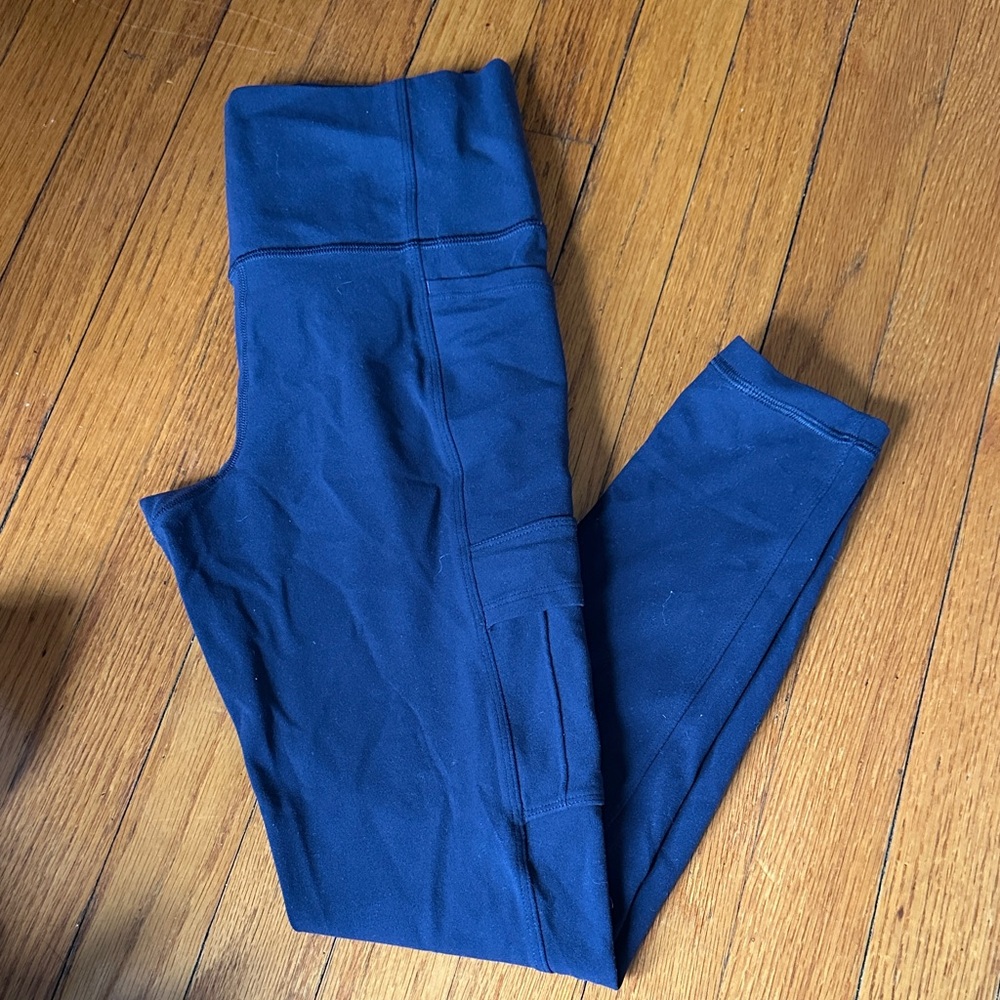 Athleta Salutation 7/8 Deep Blue High-Waisted Leggings